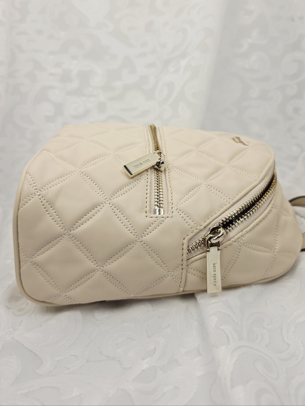 kate spade New York Quilted Cream Mini Backpack - Picture 2 of 10